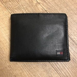 Tommy Hilfiger used black wallet.